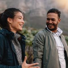 Couple talking while they take a walk in nature